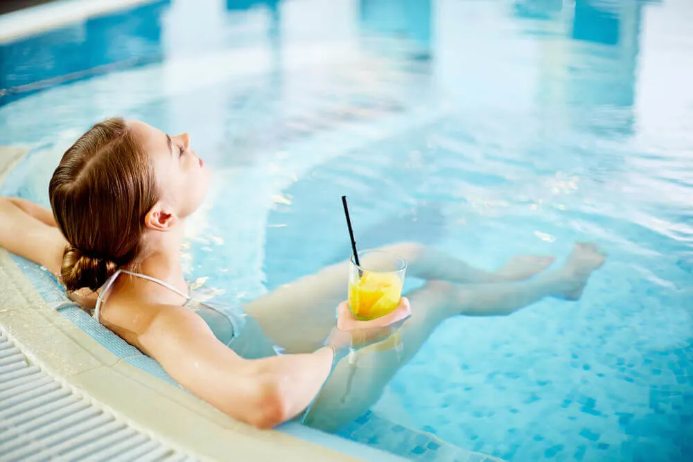 Woman enjoying in swimming pool