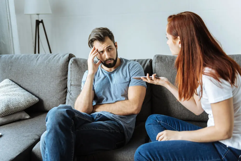 Woman Threatening Man During Argument At Home