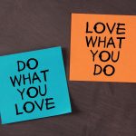 'Love What You Do and Do What You Love' notes pasted on blackboard.