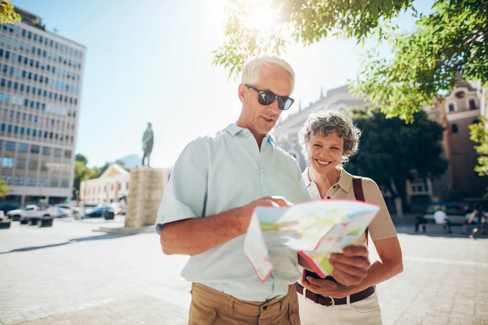 senior couple using city map