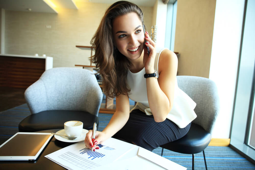 woman working in office with documents