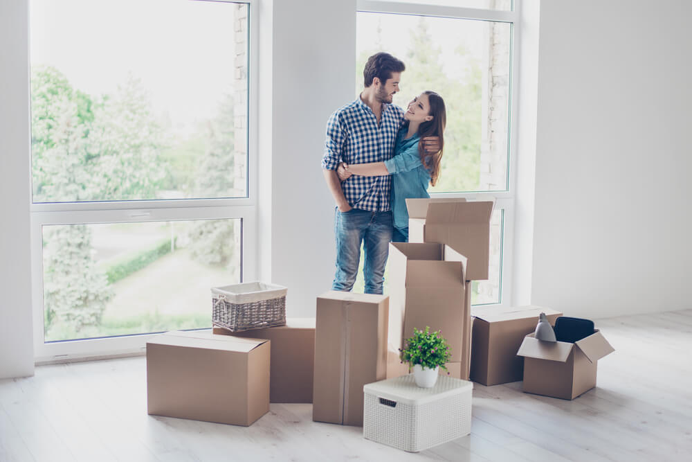 Successful young couple is moving to new nice place