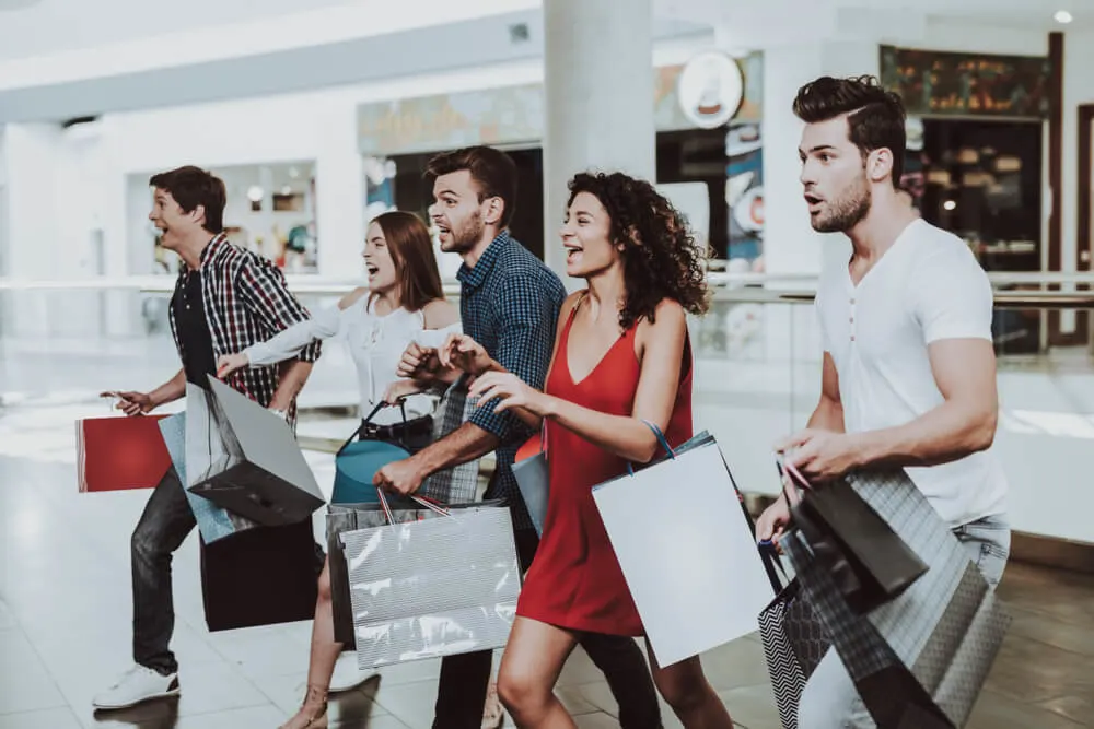 Friends shopping in mall