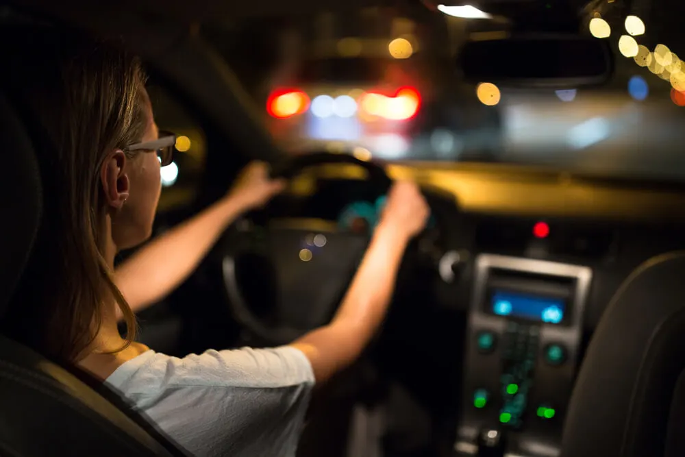 girl driving in the night