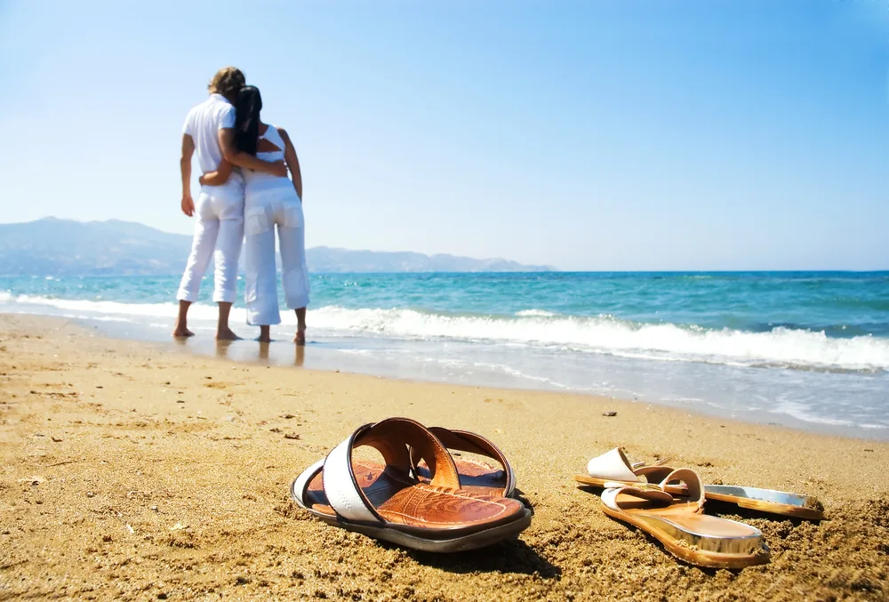 Young attractive couple at the beach