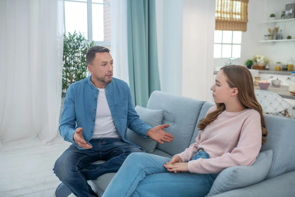 father and daughter talking