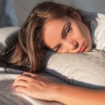 Why Do You Lay in Bed All Day? 6 Effective Tips to Change That 4 tired lazy asian young woman