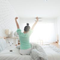 woman stretching after wake up