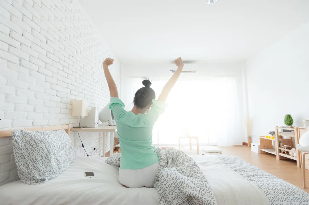 woman stretching after wake up