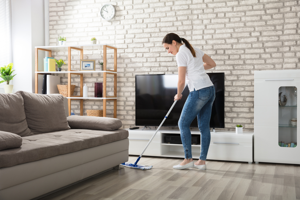 Woman Cleaning Floor