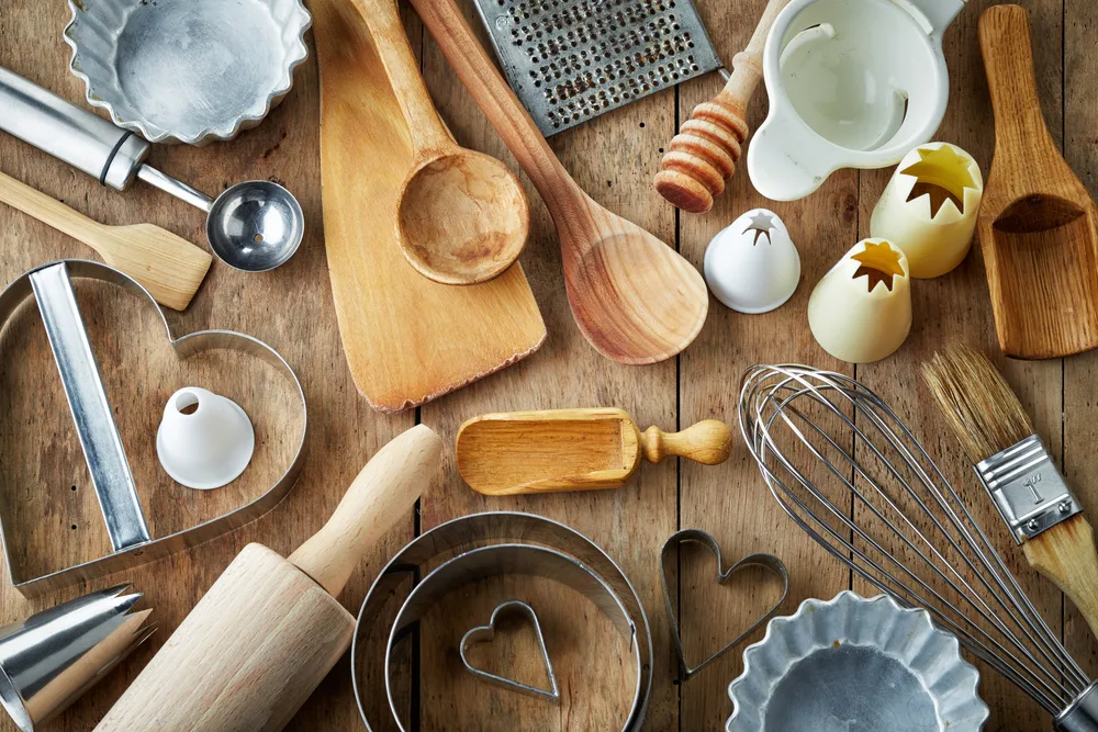 kitchen utensils on wooden table